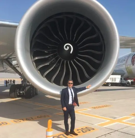 ALS team member beside a wide-body jet engine on the apron at the Dubai Airshow 2017